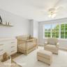 Versatile bedroom currently styled as an nursery.