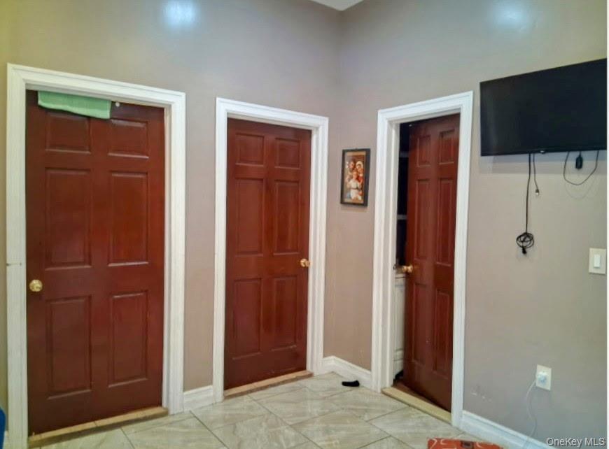 Foyer with baseboards