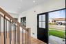 Foyer entrance with stairway, light wood-style floors, and recessed lighting