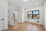 Unfurnished bedroom featuring ornamental molding, light wood-style floors, and recessed lighting