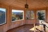Cupola, sunroom, meditation room with wood walls, wood ceiling, extraordinary view, and wood finished floors