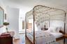 Bedroom with wood floors
