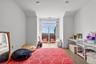 Playroom featuring light wood-style floors and baseboards