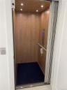 Detailed view of recessed lighting and elevator