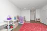 Bedroom with dark wood-type flooring and recessed lighting