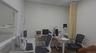 Office with a paneled ceiling