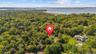Drone / aerial view of a heavily wooded area