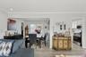 Dining room featuring ornamental molding, light wood-style flooring, and recessed lighting
