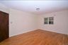 3rd Floor Bedroom featuring light wood-style floors and baseboards