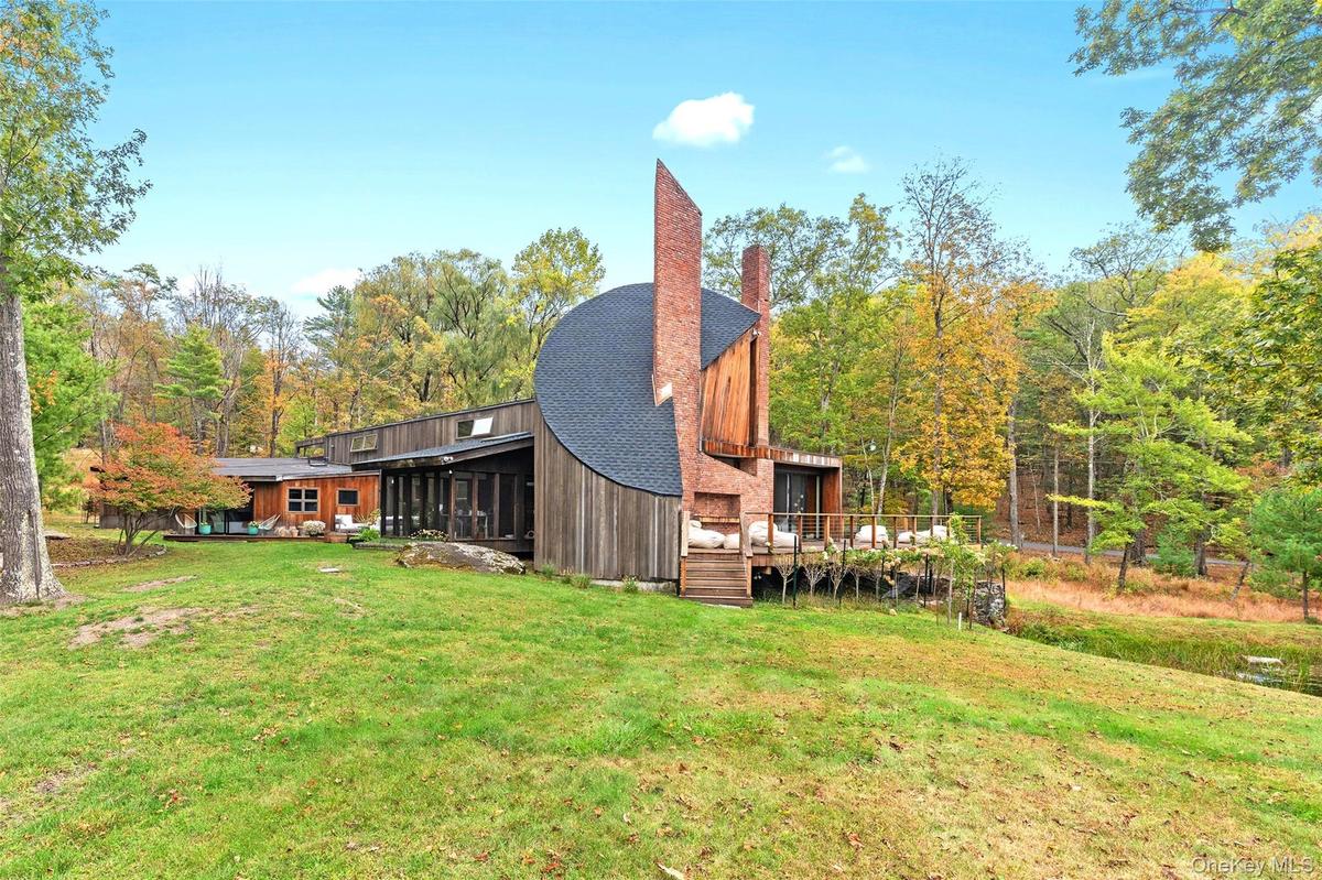 Rear view of property from pool area.