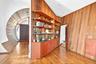 Entry and bookshelves seen from LR.