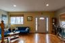 Foyer with hardwood / wood-style flooring and recessed lighting