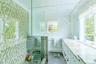 Bathroom with vanity, plenty of natural light, and a shower stall