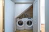 Washroom featuring washing machine and clothes dryer