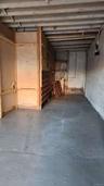 Basement featuring a garage