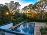 Outdoor pool featuring a wooden deck