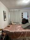 Bedroom with a textured ceiling