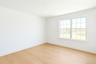 Unfurnished room with baseboards and light wood-style flooring
