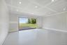 Empty room featuring recessed lighting and speckle patterned floor