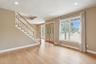 Foyer featuring french doors, stairway, light wood finished floors, and recessed lighting