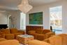 Living room featuring a chandelier, recessed lighting, and arched walkways