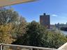 Balcony featuring a view of city