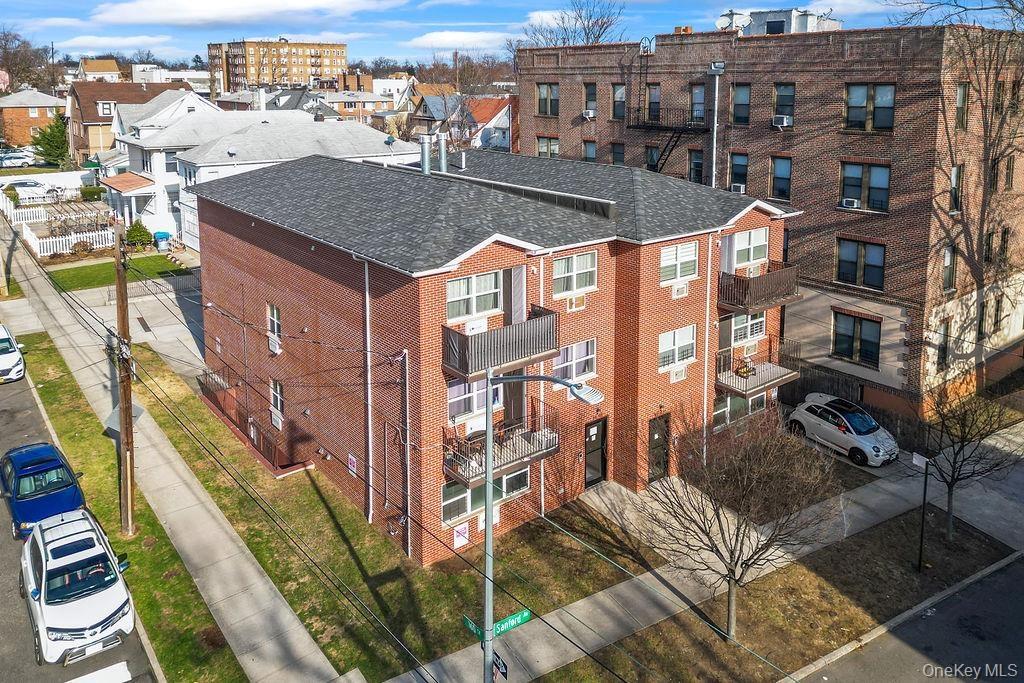 Drone / aerial view of apartment complex / building
