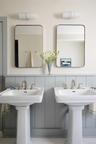 Bathroom featuring tasteful backsplash
