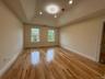 Photos from another house with light wood-style floors, and a tray ceiling...