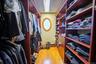 Spacious closet with light wood-style floors