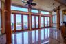 Living room with french doors, a ceiling fan, radiator, and recessed lighting