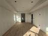 Unfurnished room featuring light wood-type flooring, a tray ceiling, recessed lighting, and crown molding