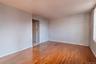 Unfurnished room with light wood-type flooring