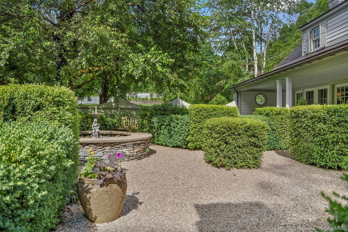 View of yard with view of wooded area