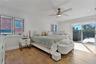 Bedroom featuring light wood-style floors, access to outside, a ceiling fan, and recessed lighting