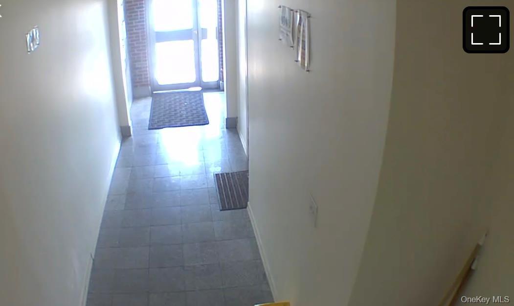 Hall featuring baseboards