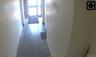 Hall featuring baseboards