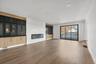 Unfurnished living room featuring a premium fireplace, recessed lighting, and light wood-type flooring