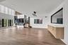 Unfurnished living room with plenty of natural light and light wood-style floors