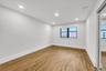 Empty room featuring recessed lighting and light wood-style flooring
