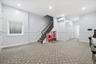 Rec room featuring recessed lighting and a wall unit AC