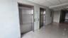 Corridor featuring elevator, tile patterned floors, crown molding, and a paneled ceiling