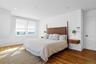 Primary bedroom oak flooring, panoramic Hudson River view