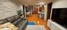 Living area featuring light wood-type flooring and recessed lighting