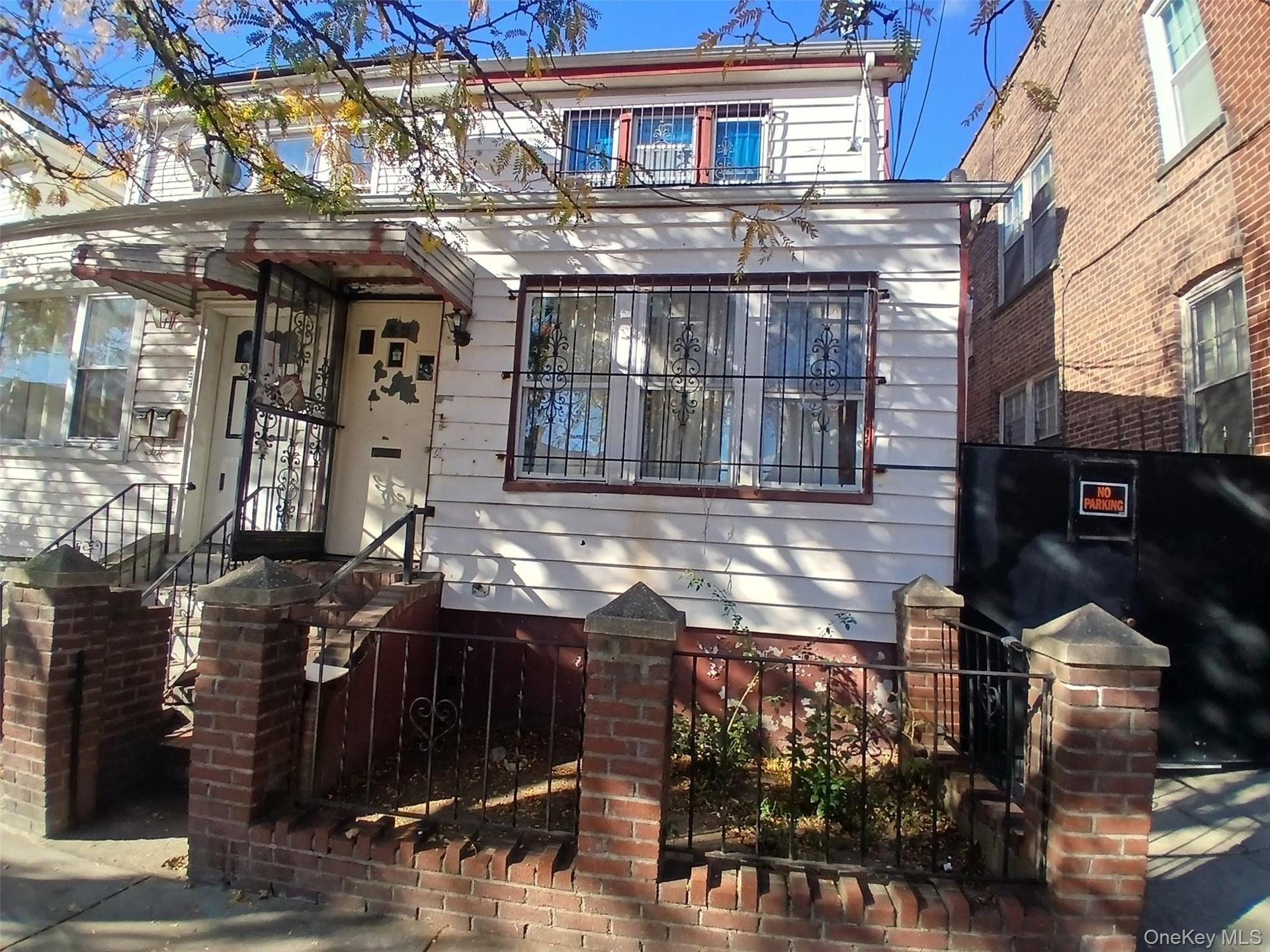 View of front of property with a fenced front yard