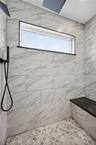Bathroom featuring  tile shower