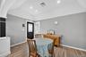 Dining room featuring wood-type floors and recessed lighting