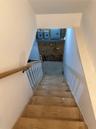 Stairway featuring electric panel