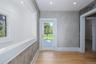 Mudroom with W/D hookup. Access to full-finished basement and pool deck