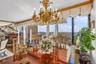 Dining area with healthy amount of natural light and a chandelier